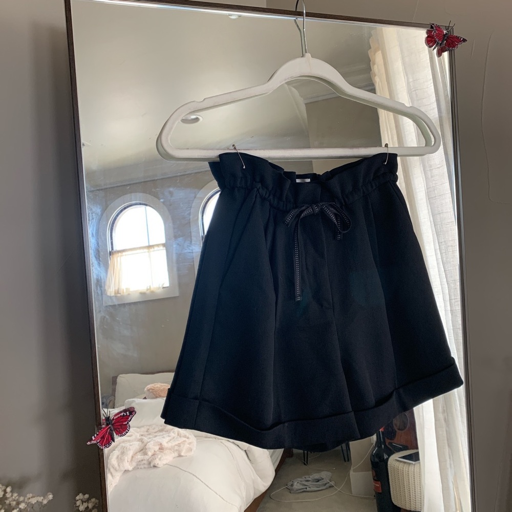 black shorts ruffled at the top